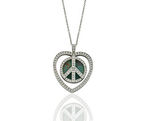 Necklace featuring a large heart shaped element surrounding a peace sign